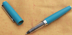 J Herbin Blue metal roller ball pen with fine nib and tin of 6 Blue Bleu Myosotist cartridges