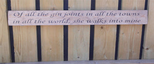 Wooden sign Of all the gin joints in al the towns in all the world she walks...