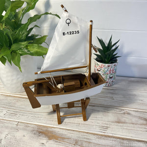 Decorative wooden model sailboat Optimist | 30cm (w) x 45cm (h) x 13.5cm (d) | Fully assembled model |Hand-painted and handmade from wood.