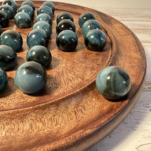 Load image into Gallery viewer, 30cm Diameter MANGO WOOD SOLITAIRE BOARD GAME with Midnight Blue Glass Marbles | |classic wooden solitaire game | strategy board game | family board game | games for one | board games
