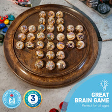 Load image into Gallery viewer, 30cm Diameter DARK WOOD SOLITAIRE BOARD GAME with HELTER SKELTER GLASS MARBLES | |classic wooden solitaire game | strategy board game | family board game | games for one | board games
