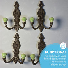 Load image into Gallery viewer, Set of 4 𝗙𝗥𝗘𝗡𝗖𝗛 𝗦𝗧𝗬𝗟𝗘 𝗖𝗔𝗦𝗧 𝗜𝗥𝗢𝗡 𝗗𝗢𝗨𝗕𝗟𝗘 𝗛𝗢𝗢𝗞𝗦 – Lime Green Ceramic Tops, Wall Coat Hooks for Hallway, Cloakroom, Bedroom

