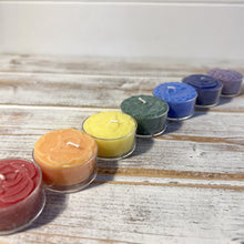 Load image into Gallery viewer, Chakra tea light candles set of 7 | each a different colour and with a different fragrance to represent 7 chakras | 100% pure natural Palm Wax and contain 3% pure essential oils
