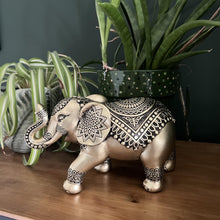 Load image into Gallery viewer, Exquisite Golden Elephant Statue: Elegant Ornament in Brilliant Gold Hue - Perfect for Home Decor
