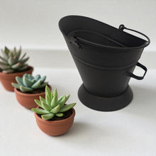 Load image into Gallery viewer, 𝗪𝗔𝗧𝗘𝗥𝗟𝗢𝗢 𝗦𝗧𝗬𝗟𝗘 𝗕𝗟𝗔𝗖𝗞 𝗠𝗔𝗧𝗧 𝗙𝗜𝗡𝗜𝗦𝗛 𝗖𝗢𝗔𝗟 &amp; 𝗔𝗦𝗛 𝗕𝗨𝗖𝗞𝗘𝗧 𝟭𝟲” | H35cm x Dia28cm | Heat-Resistant Metal Bucket for Fireplace | Log Burner or Stove | 𝗙𝗜𝗥𝗘𝗦𝗜𝗗𝗘 Accessory for Ash, Coal &amp; Log Storage
