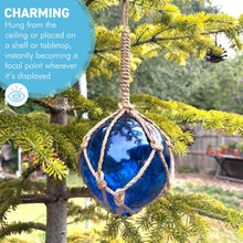 Load image into Gallery viewer, DEEP BLUE GLASS FISHING FLOAT ORNAMENTAL SEA BUOY | hand blown | nautical seafaring fishing rustic décor | 10cm diameter | with rustic brown string netting and hanging loop | Japanese style glass fishing floats
