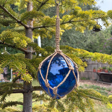 Load image into Gallery viewer, DEEP BLUE GLASS FISHING FLOAT ORNAMENTAL SEA BUOY | hand blown | nautical seafaring fishing rustic décor | 10cm diameter | with rustic brown string netting and hanging loop | Japanese style glass fishing floats
