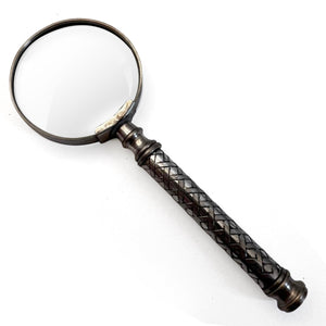 Vintage Silver Handheld Magnifier with woven lattice pattern handle, perfect for reading and precision tasks