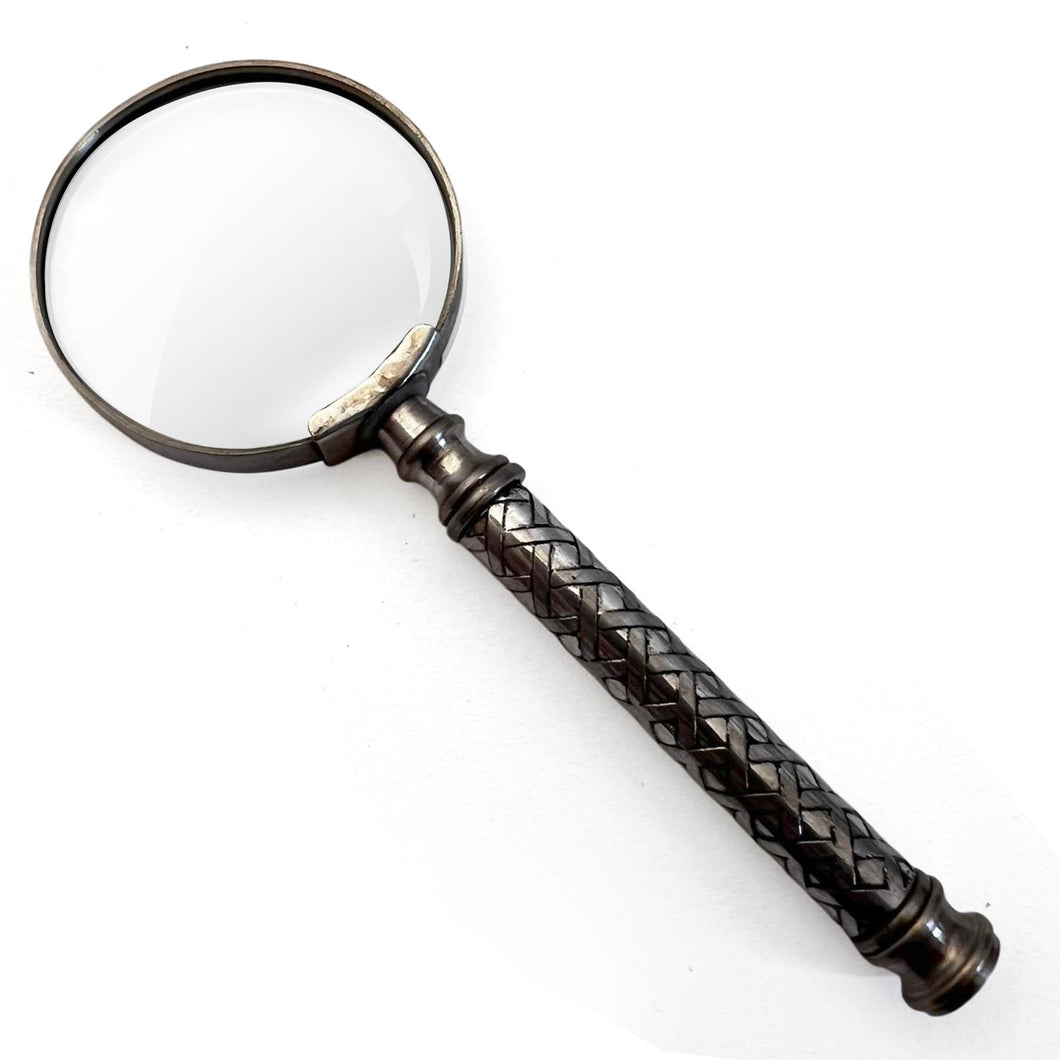 Vintage Silver Handheld Magnifier with woven lattice pattern handle, perfect for reading and precision tasks