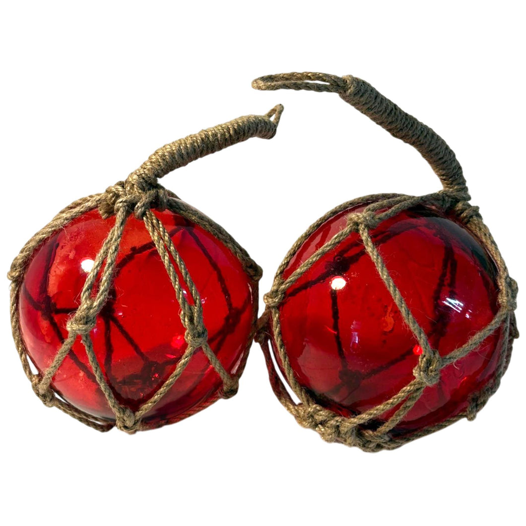 TWO DEEP RED GLASS FISHING FLOAT ORNAMENTAL SEA BUOY | hand blown | nautical seafaring fishing rustic décor | 10cm diameter | with rustic brown string netting and hanging loop | Japanese style glass fishing floats