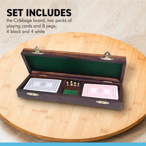 Wooden cribbage board with pegs and two packs of playing cards