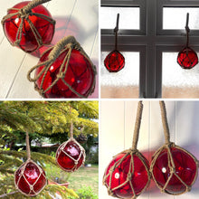 Load image into Gallery viewer, TWO DEEP RED GLASS FISHING FLOAT ORNAMENTAL SEA BUOY | hand blown | nautical seafaring fishing rustic décor | 10cm diameter | with rustic brown string netting and hanging loop | Japanese style glass fishing floats
