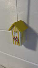 Load and play video in Gallery viewer, Pair of Yellow beach hut light pulls | Nautical Theme Wooden Beach Hut Cord Pull Light Pulls
