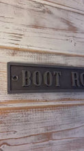 Load and play video in Gallery viewer, The Boot Room Plaque – A Cast Iron Wall Sign with an Antique Iron Finish

