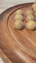 Load and play video in Gallery viewer, 30cm Diameter 𝗪𝗢𝗢𝗗𝗘𝗡 𝗦𝗢𝗟𝗜𝗧𝗔𝗜𝗥𝗘 𝗚𝗔𝗠𝗘 Board with Solid Wooden Marbles – Classic Strategy Board Game, Family Game, Unique Home Decor
