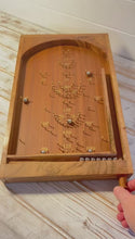 Load and play video in Gallery viewer, Classic vintage style 𝗧𝗔𝗕𝗟𝗘𝗧𝗢𝗣 𝗣𝗜𝗡𝗕𝗔𝗟𝗟 𝗕𝗔𝗚𝗔𝗧𝗘𝗟𝗟𝗘 𝗚𝗔𝗠𝗘 50cm x 30cm, Spring plunger with brass pins and steel balls, Shesham Rose wood board, vintage traditional pub game
