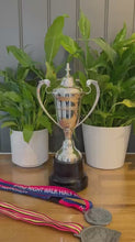 Load and play video in Gallery viewer, The 30cm Silver Trophy Cup – Aluminium with a Contrasting Black Base
