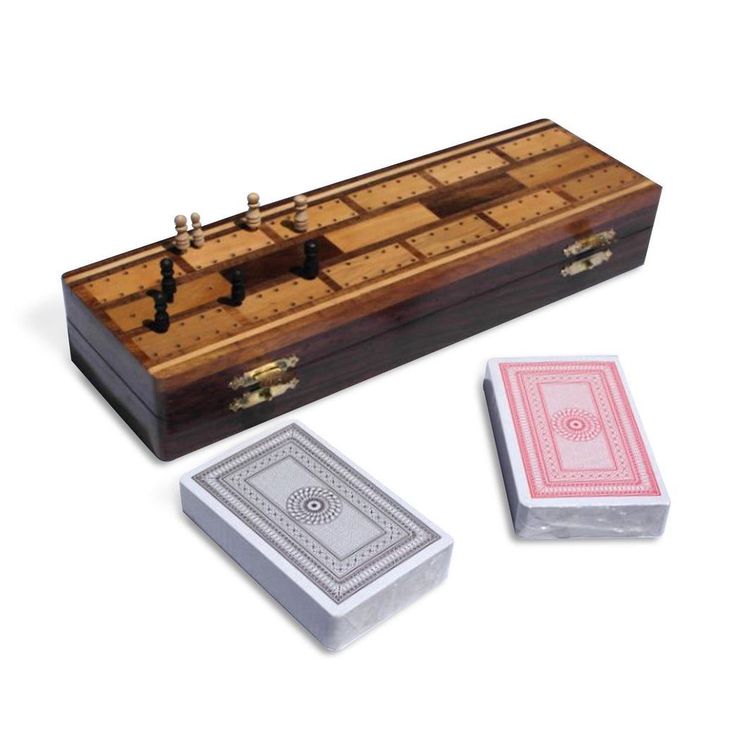 Wooden cribbage board with pegs and two packs of playing cards