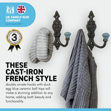 Load image into Gallery viewer, Set of 2 CAST IRON FRENCH STYLE DOUBLE ORNATE HOOKS | Duck Egg Blue Ceramic Ball Tops | Cloakroom Hook | Decorative Double Hook, hat and coat hook | 15cm x 11cm. .
