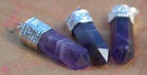 Set of three silver plated Amethyst pencil point pendants