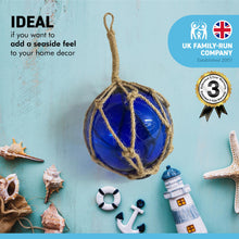 Load image into Gallery viewer, OCEAN BLUE GLASS FISHING FLOAT ORNAMENTAL SEA BUOY | hand blown | nautical seafaring fishing rustic décor | 10cm diameter | with rustic brown string netting and hanging loop | Japanese style glass fishing floats
