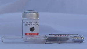 J Herbin Transparent roller ball pen with six black ink cartridges