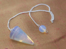 Load image into Gallery viewer, Opalite crystal pendulum dowser on silver chain with pendulum board
