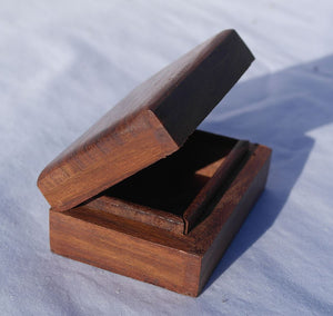 Beautiful simple wooden handy box with Celtic knot design on the lid