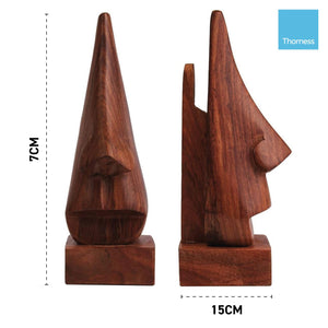 Nose shaped wooden spectacle holder