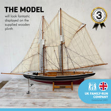Load image into Gallery viewer, DETAILED WOODEN ASSEMBLED DISPLAY MODEL OF BLUENOSE CANADIAN FISHING RACING SCHOONER YACHT| Ready for display | adjustable rigging blocks sewn cotton sails | Length 80cm height 66cm
