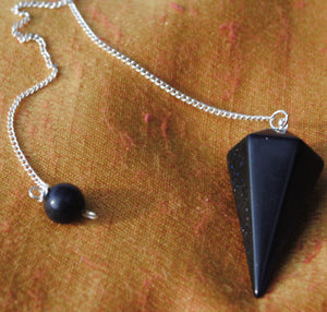 Blue goldstone faceted pendulum and board