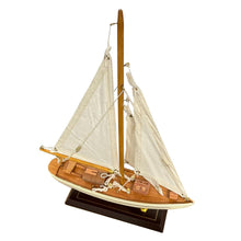 Load image into Gallery viewer, Detailed wooden assembled display model of an Americas Cup Racing Yacht with cream hull | ready for display | adjustable rigging blocks sewn cotton sails | length 25cm height 35cm
