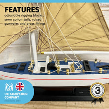 Load image into Gallery viewer, DETAILED WOODEN ASSEMBLED DISPLAY MODEL PRECISION RACING YACHT | Ready for display |features adjustable rigging blocks sewn cotton sails raised gunwales and brass fittings | 43cm (H) x 30.5cm (L)
