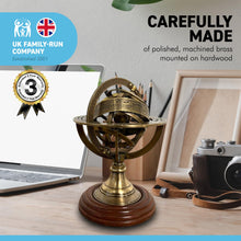 Load image into Gallery viewer, ARMILLARY SPHERE PAPERWEIGHT | NAUTICAL ORNAMENTAL PAPER WEIGHT | 13cm high | Revolving centre | Nautical gifts for desk | Machined brass mounted on hardwood |mantelpiece ornament
