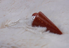 Load image into Gallery viewer, Goldstone quartz cone pendulum dowser on silver chain with pendulum board
